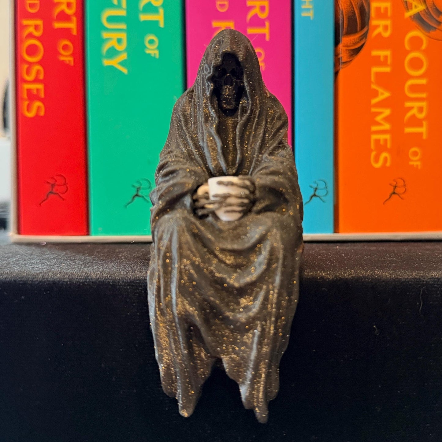 ACOTAR inspired Suriel with tea mug 3d printed shelf sitter, as seen in black/gold glitter and white color option.